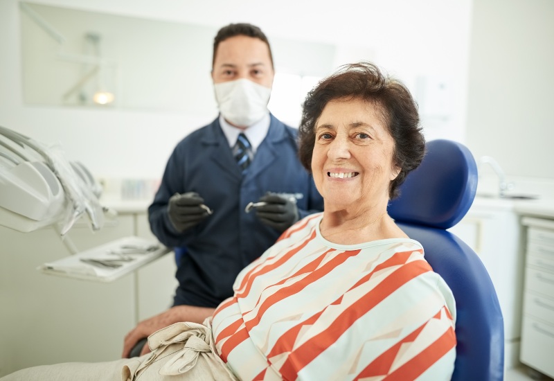 Smiling patient during checkup in Livonia, MI